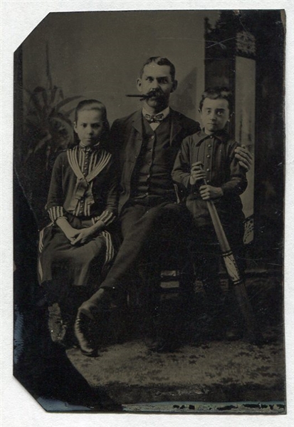 Circa 1870s Tintype Boy with Ring Bat
